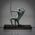 Green patinated bronze sculpture of an archer by Michel Decoux (1837-1924). This petite Art Deco sculpture beautifully...