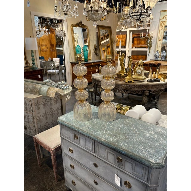 Exquisite pair of modern pale pink opalescent Murano glass lamps. The glass on these absolutely glistens. Fabulous!!