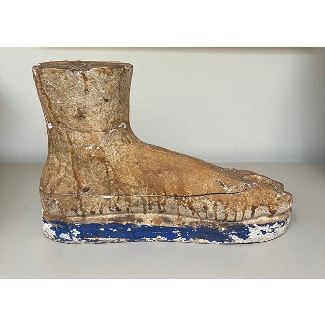 Oversized carved pine foot sculpture with gesso accents.