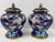 A striking pair of vintage Chinese cloisonné ginger jars featuring richly colored enamel decoration against a deep cobalt-...