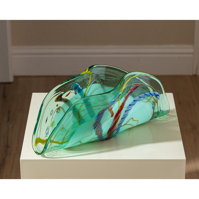 Sculptural blown art glass vessel attributed to VIZ Art Glass Collections, circa 2000. The dramatic free-form fan shape is...