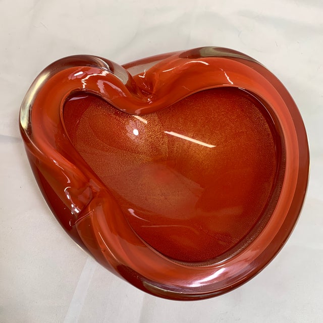 Features a gorgeous, fiery red-orange sommerso/cased core wrapped in a thick, crystal-clear glass base with subtle,...