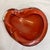 Features a gorgeous, fiery red-orange sommerso/cased core wrapped in a thick, crystal-clear glass base with subtle,...
