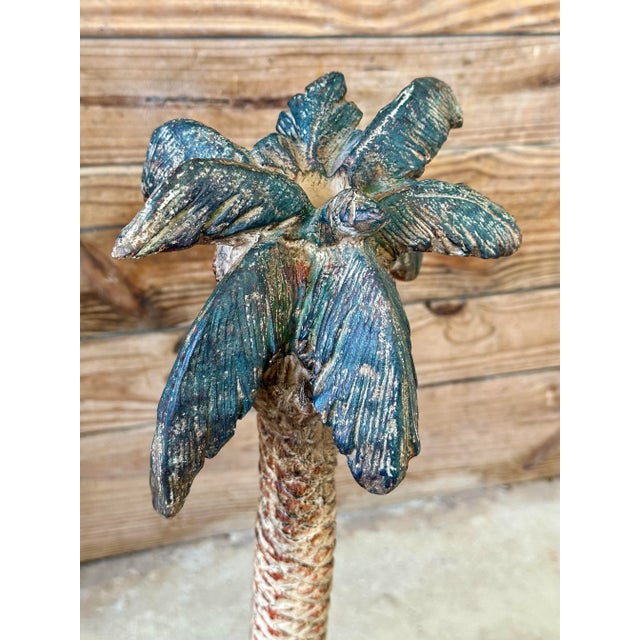 Bring a touch of Old Florida and island-inspired charm to any space with this striking pair of sculptural metal palm tree...
