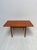Minimalistic vintage dining table original from the 1960s in teak by poul hundevad. Can be extended on two sides with a...