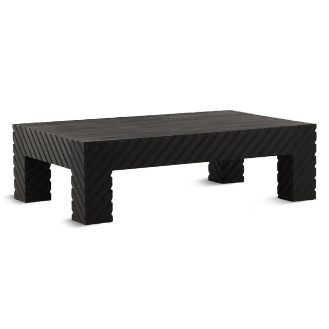 Modern black finish acacia wood coffee table with unique diagonal scored line pattern on sides and legs. Weighs approx....