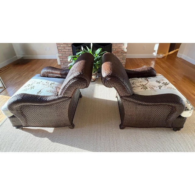 A Pair of Custom Lounge Chairs and Ottomans by Mark Hampton for Hickory Chair Upholstered in Colefax and Fowler Meet the...