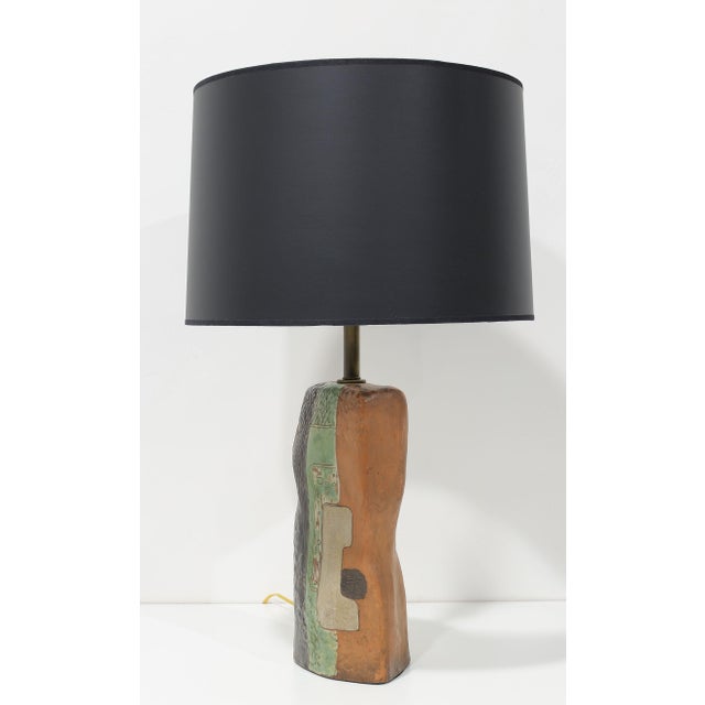 Measurement is to top of light socket. As shown with lamp shade is 31" High. Shade not included. We have a complimentary...