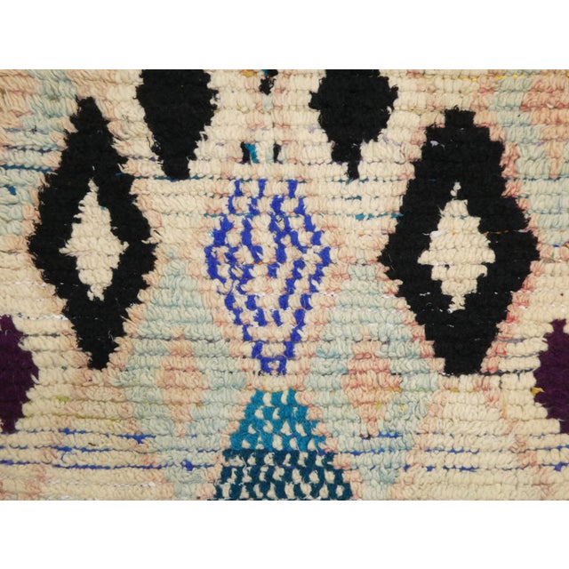 Midcentury Boujad runner handwoven with beige, black and blue wool in an abstract Berber design. Dimensions: 2.8 X 10.2