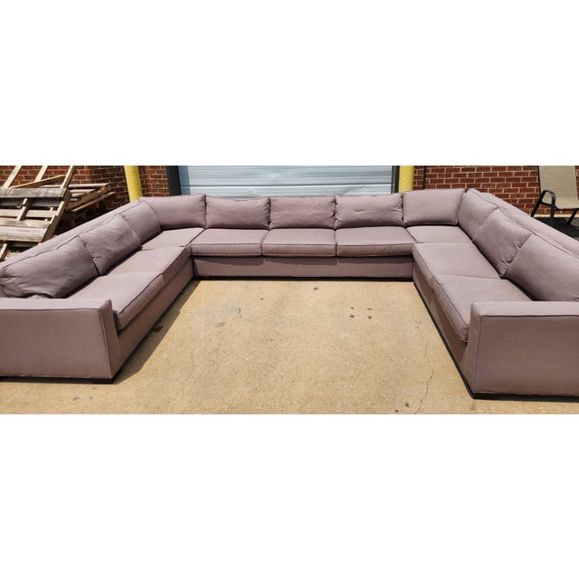 This substantial sectional is designed for serious lounging and entertaining, with deep seating, wide arms, loose back...