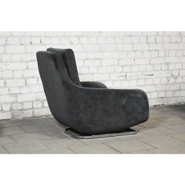 Set of Shaman Lounge Chair and Ottoman by Eric Jourdan for Ligne Roset, France, 2000s, in Good conditions. Designed from...