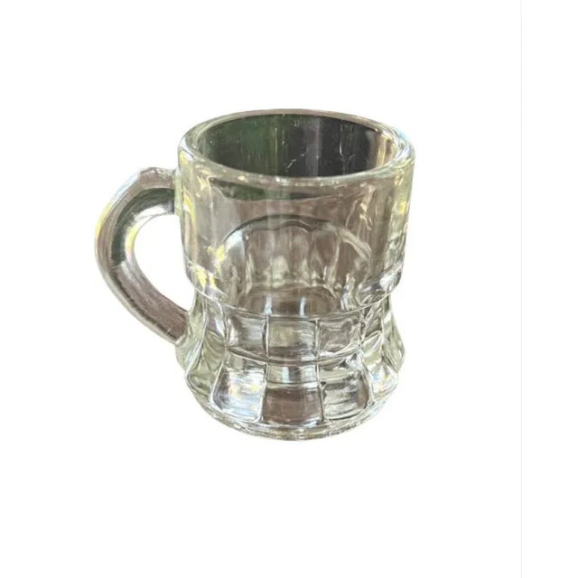 Set of 6 little clear glass beer mugs These aren’t for football watching— Limoncello might be the sip here.