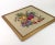 Colorful flowers and fruit make up this gorgeous needlepoint design. We have plums, apples, pineapple, grapes, and...
