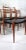 A set of six dining chairs in teak by n. O. Moller for jl moller covered with original skai black leather, in very good...