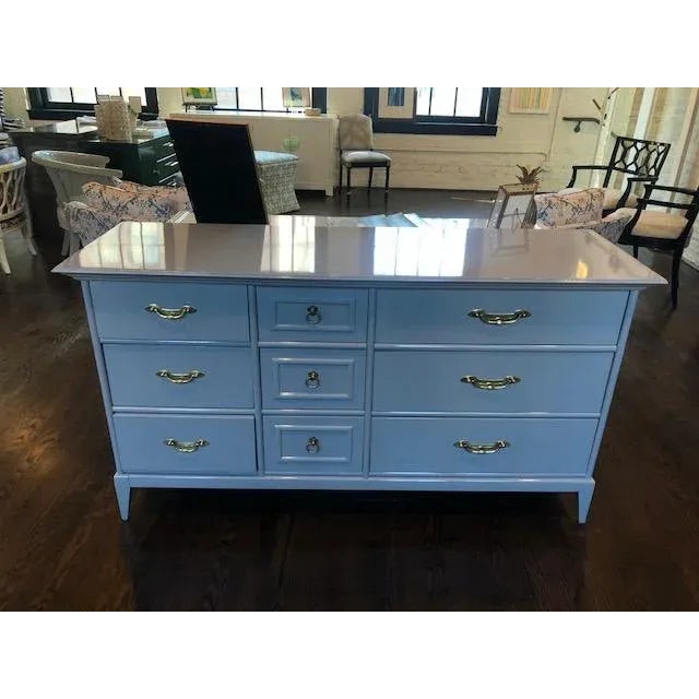 * This piece is ready for immediate delivery * Finished in New Hope Gray by Benjamin Moore in high-gloss * Manufactured by...