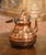 Full of authentic provincial character, this antique copper tea kettle features a beautifully rounded form and warm,...