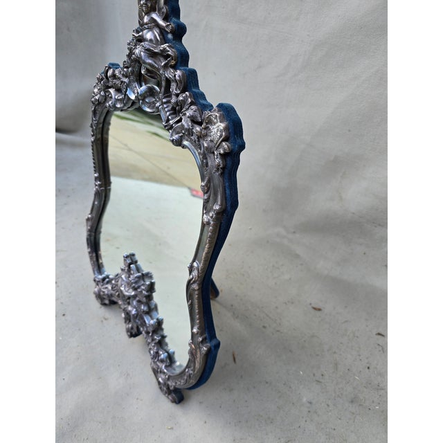 This is an exquisite sterling silver Vanity mirror in a Victorian style with cherubs and flowers. This would be the...