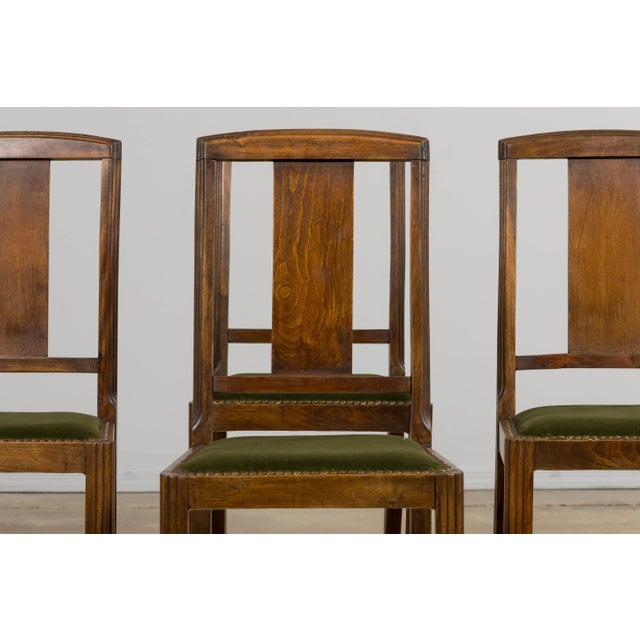 A striking set of six French Art Deco dining chairs, dating to the 1930s and sourced in Provence, France. Each chair is...
