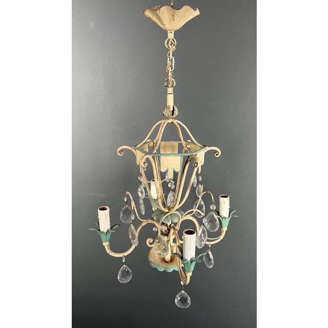 This beautiful decorative hot air balloon is made of patinated sheet metal with crystals. It is a French work. Circa 1940