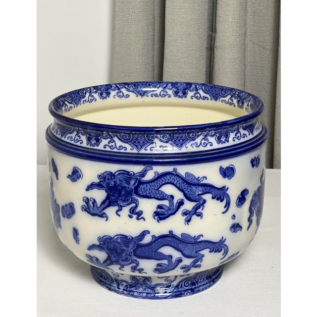 Rare Royal Doulton 'Oyama' pattern porcelain jardiniere, circa 1910. Flow blue jardiniere with a chinoiserie scene of...