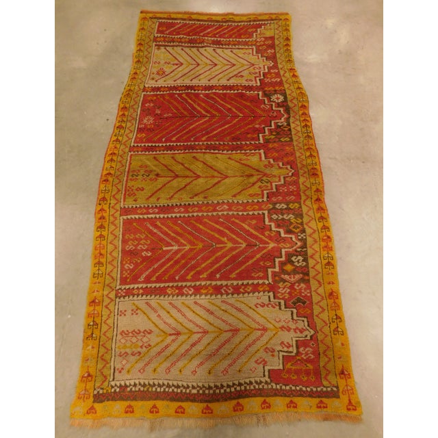 Oushak saf rug with 5 compartments in multi shades and colors.