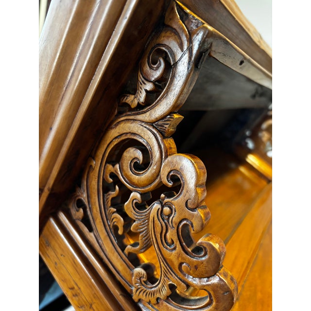 This uniquely beautiful early 19th century handcarved Ruyi Elmwood altar table has been lovingly maintained and enjoyed...