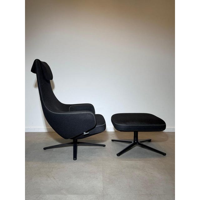 Elegant vitra repos lounge chair with matching ottoman , designed by antonio citterio . The repos combines the comfort of...
