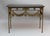 19th century French wrought iron console tables decorated with garlands and swags of floral decoration and original slate...