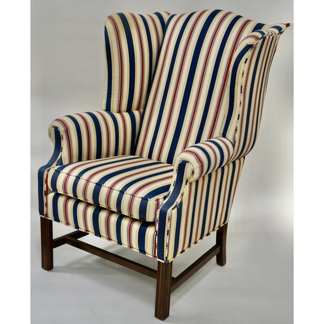 This is a really classic Chippendale-style wingback chair by Ethan Allen, a maker well known for producing high-quality...