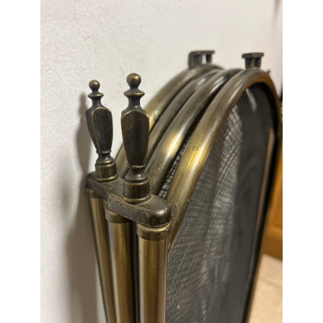 Brass gold vintage mid century four panel arched fireplace screen, metal with classical details including ornate cut out...