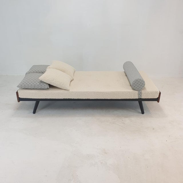 Very nice daybed, fabricated in The Netherlands in the 60s. It has 4 folding feet, see the last 2 pictures. The mattress...
