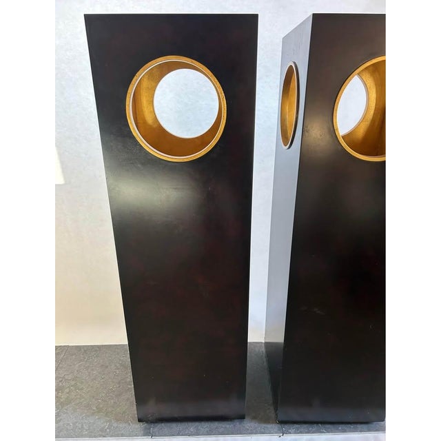 Elevate fine art, sculpture, or decorative objects with these exquisite Theodore Alexander display pedestals. Crafted with...