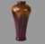 Striking large antique American art pottery vase featuring an unusual flowing flambé-style glaze and impressive 19-inch...