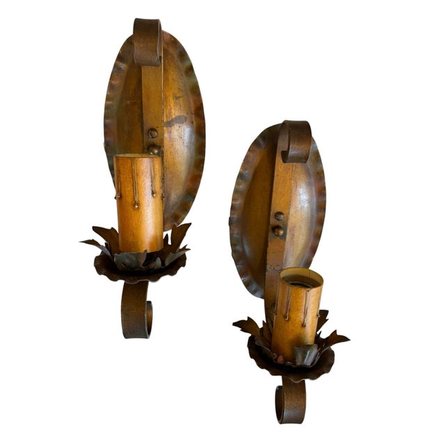 These original polychrome painted patina wall sconces feature a crimped oval backplate and a hammered finish. They feature...