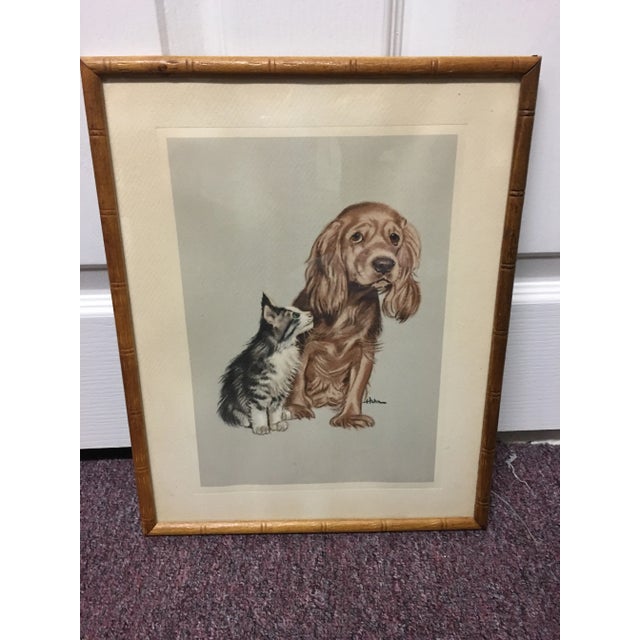 Signed Hahn puppy and kitten print in faux bamboo wood frame . Circa 1950’s