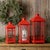 Illuminate your home with timeless charm using this Traditional Red Metal Lantern Set. Featuring a classic metal frame...