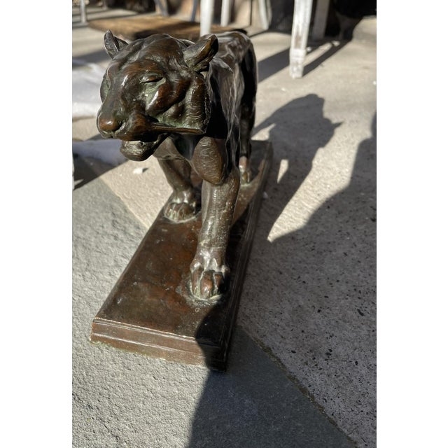 A finely cast 19th‑century French bronze of a walking tiger by Antoine‑Louis Barye (1797–1875), the master of Romantic...