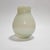 A Scandinavian style glass vase from the 1970s. Featuring a unique decoration resembling fine grains of sand. Its natural...