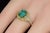 Certified natural 2.82CTS emerald and diamond solid 18K yellow gold ring. This elegant ring features a 1.91CT natural...