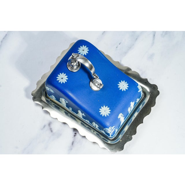 This rare 19th-century Wedgwood cheese dish is a striking example of neoclassical design, combining refined ceramic...