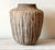 VESSEL - CAUDAL stoneware with glaze A large jar form in handbuilt black clay. The glaze was watered down and allowed to...