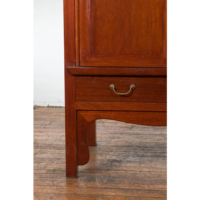 Wood Chinese Qing Dynasty Armoire with Brass Medallion and Reconfigured Pocket Doors For Sale - Image 7 of 13