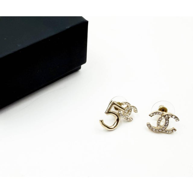 Chanel Gold CC Crystal 5 Asymmetrical Piercing Earrings *Marked 21 *Made in France *Comes with original box and pouch...