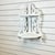 A pretty little white cutout corner shelf. The vintage piece features two shelves for your collectibles or framed...