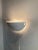 It has some little damage, There was used a lamp that became to warm some little burning oxidation They are rare and hard...