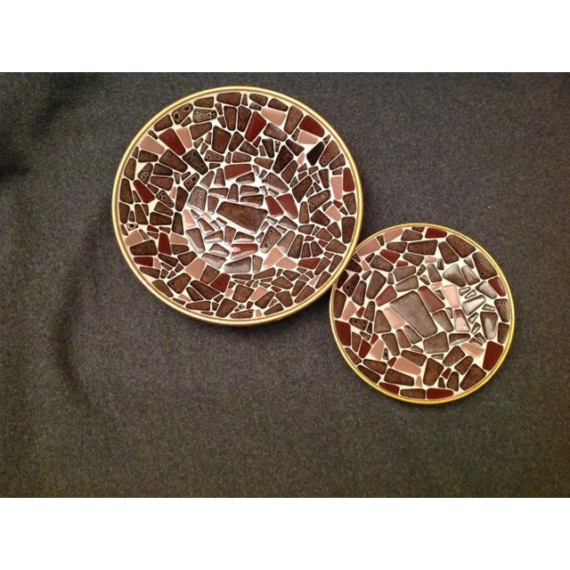 This matching Bowl (larger object) and Plate (smaller object). are stunning examples of MCM home decor which rose just...