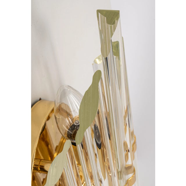 Beautiful wall light with 5 crystal glasses on a gilt brass frame-design in venini style, italy. Manufactured circa 1970s....