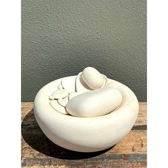 This sculptural tabletop fountain is a masterclass in Postmodern Zen aesthetics, offering a serene blend of organic form...