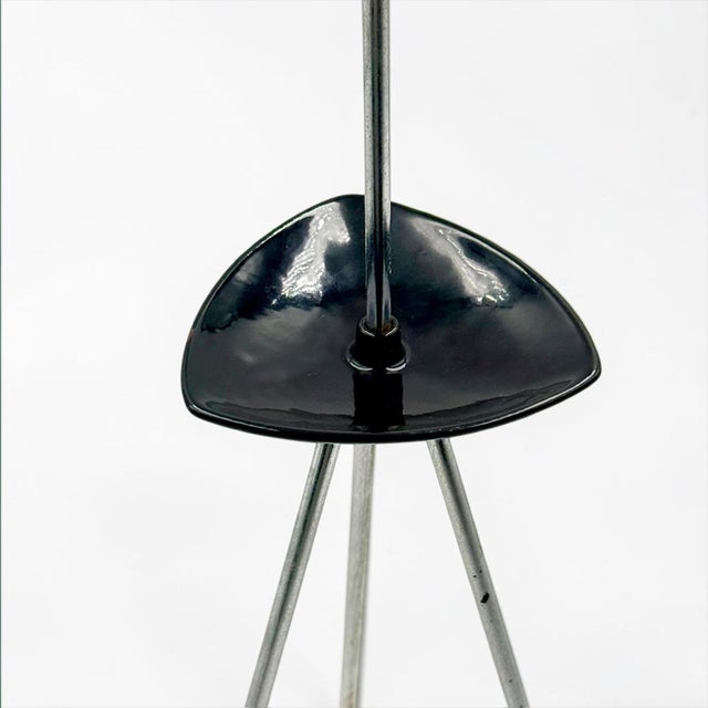 Distinctive floor-standing ashtray dating from the 1960s, constructed from a midnight blue glazed ceramic bowl supported...