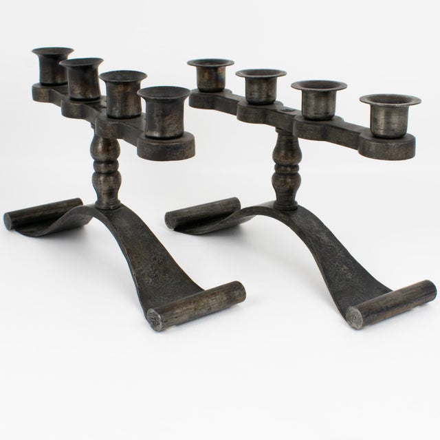 Charles Piguet (1887 - 1942) designed and crafted this stunning pair of wrought iron candelabras in the 1920s. The...